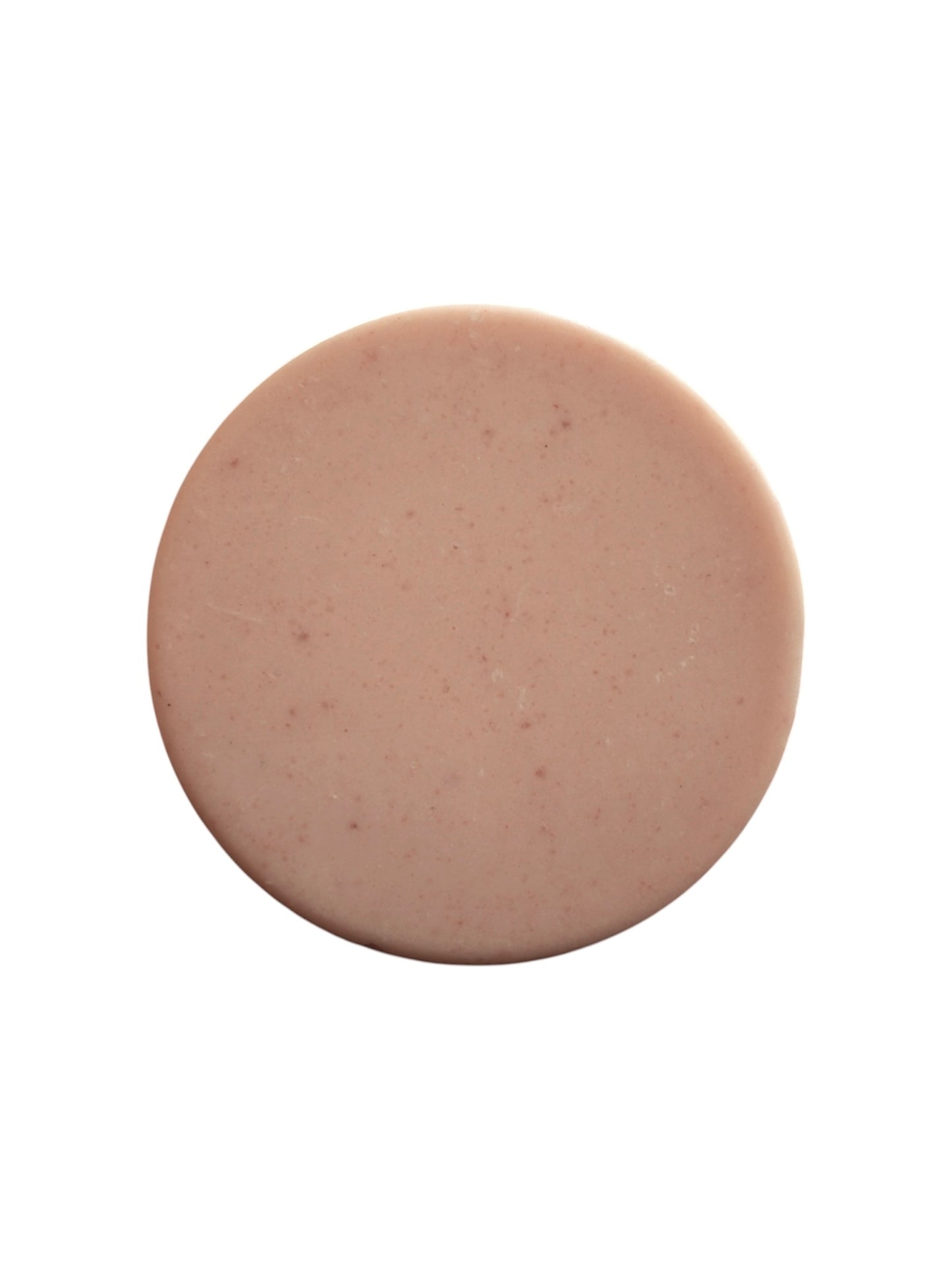 An image of Alchemy Body Werks pink circular Harmony bar soap