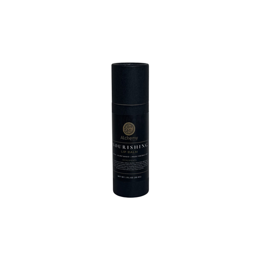 A black kraft push up container with a black label of Alchemy Body Werks Nourishing Lip Balm on a white background.