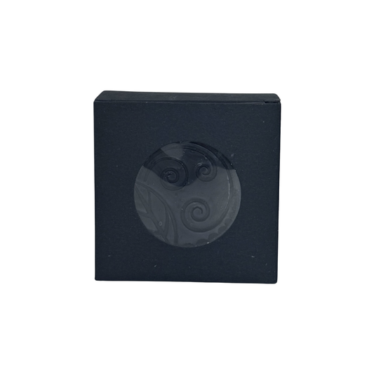 Alchemy Body Werks Onyx soap bar in a matte black box on a white background.